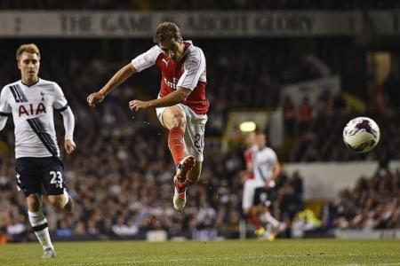 Flamini sparks Arsenal as Tottenham continue to pay for slack transfer policy