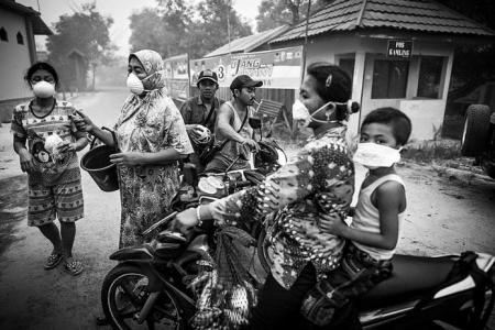 S'pore NGO takes 25,000 masks to Central Kalimantan where PSI is 1,500