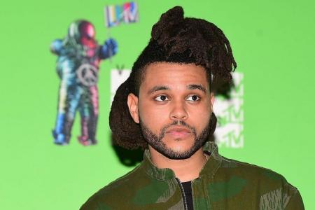 Canadian music stars The Weeknd, Drake and Justin Bieber rule US charts