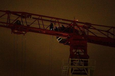 SCDF mounts dramatic rescue from crane