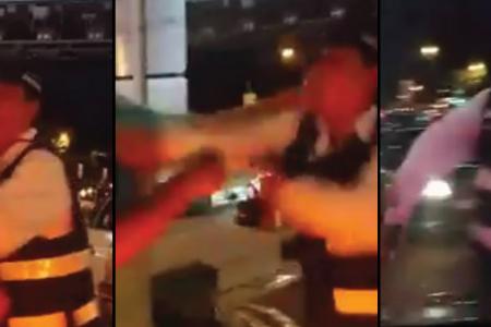 LTA suspends enforcement officer caught on camera fighting with driver