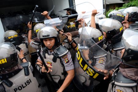 Bali police seize spears, machetes after deadly prison brawl