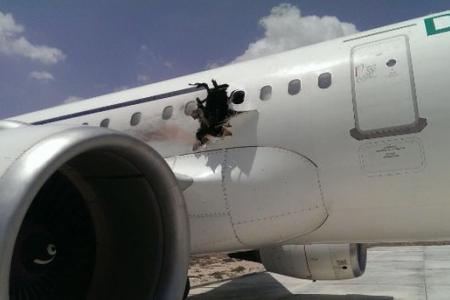 Man 'drops' from plane after explosion