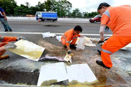 More than 3 oil spills on Singapore's roads every day