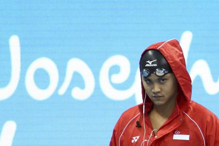 Which songs get Joseph Schooling's head in the game?