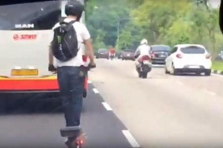 E-scooter rider dices with death by overtaking bus 