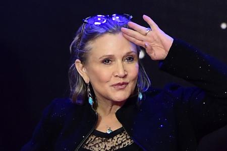 Celebrities wish Carrie Fisher speedy recovery Gomez visits children&#039;s hospital on Christmas Eve
