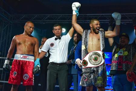 Rafi is first local male to win  pro boxing title
