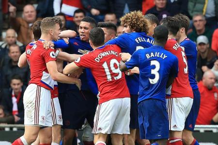 Ugly clashes mar United&#039;s win