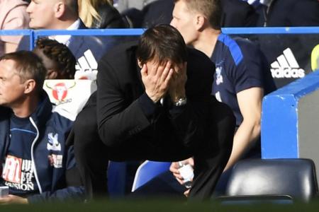 Chelsea manager Antonio Conte looks dejected