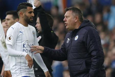  Leicester City manager Craig Shakespeare speaks with Riyad Mahrez