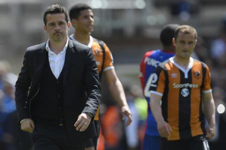 Hull City manager Marco Silva looks dejected after the match