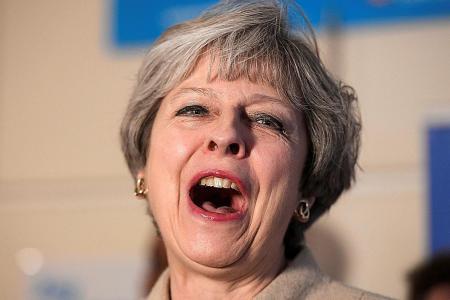 Theresa May&#039;s lead slashed after publishing manifesto