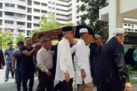 The casket of Staff Sgt Nadzrie Matin arrives at his home in Choa Chua Kang 