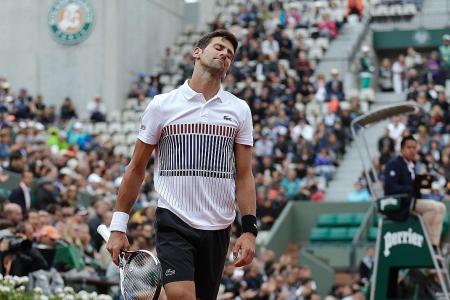 McEnroe blasts Djokovic for giving up