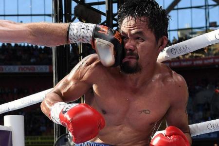 Pacquiao vows to continue fighting despite controversial loss