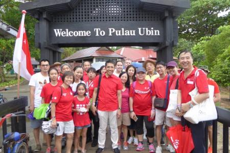 Learning about Singapore on a walking trail at Pulau Ubin