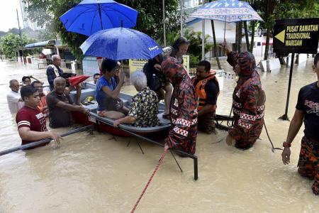 Heavy rains trigger Penang floods