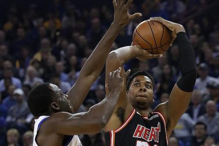 Durant, Green help Warriors beat the Heat