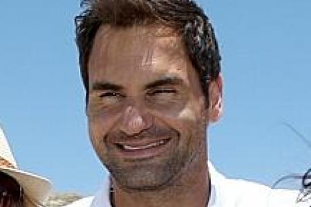 Federer aims to keep expectations in check