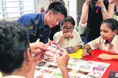 Students learn about Total Defence through GOTC card game