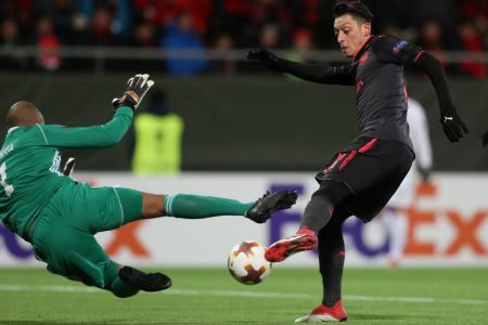 Oezil scores as Arsenal defeat Ostersunds 3-0