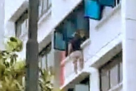 Woman, daughters pull disraught neighbour on window ledge to safety