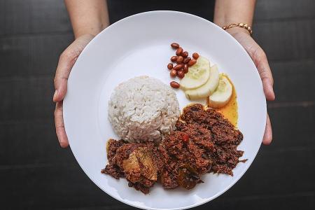 South-east Asians unite to defend non-crispy chicken rendang