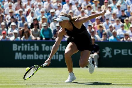 Wozniacki rallies to defeat Kerber, reach final