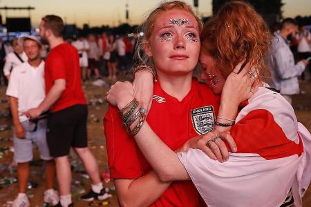 Forlorn but proud, fans applaud England despite defeat