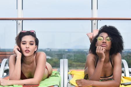 MUS finalists make a splash on board Genting Dream for swimwear shoot