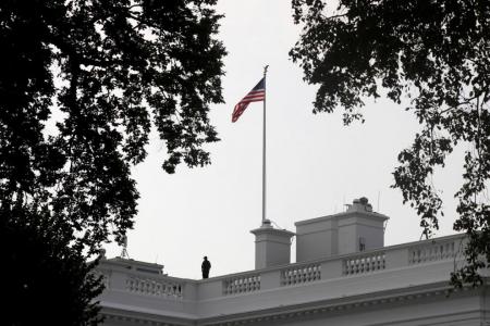 White House wobbles on US flag after McCain’s death