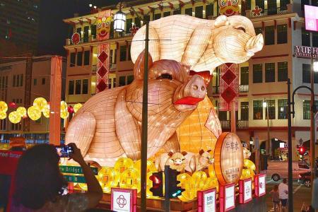 Chinatown pig lanterns mocked by netizens to be lit as planned