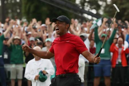 Woods wins the Masters to claim first major in 11 years