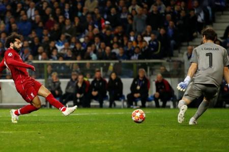 Salah shines as Liverpool see off Porto