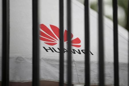 China warns top tech firms after US Huawei ban
