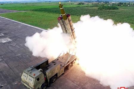 N. Korea’s Kim oversees test of ‘super-large’ rocket launcher