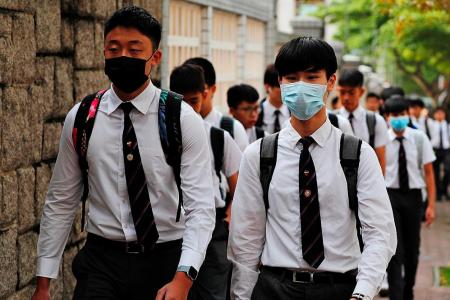 HK students wear masks to school in protest of ban