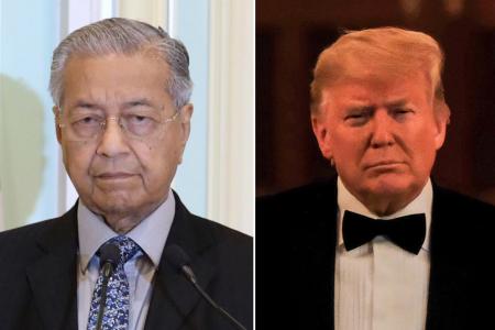 Mahathir says he called for Trump's resignation to save US