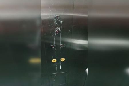 lift buttons covered in spittle