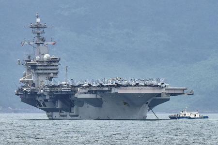 US Navy evacuates sailors from coronavirus-struck aircraft carrier