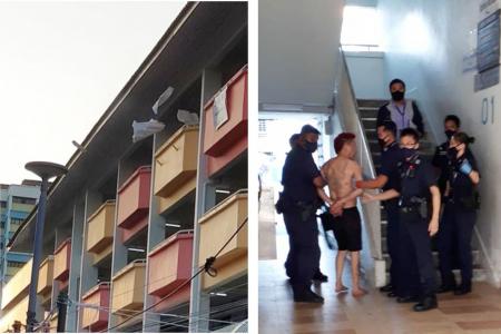 Man arrested after throwing items, including chairs, from HDB block