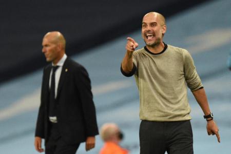 Guardiola urges City to keep calm and carry on winning