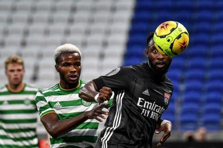 Celtic defender Boli Bolingoli (left).