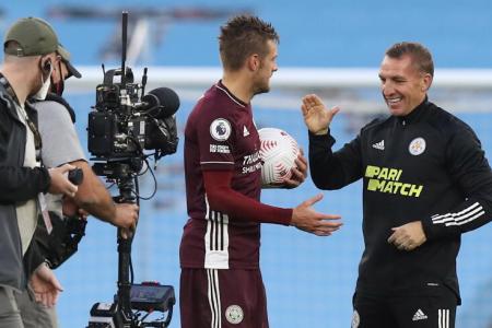 Brendan Rodgers (right) congratulates striker Jamie Vardy.