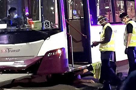 52-year-old man trapped under bus for 15 minutes after collision