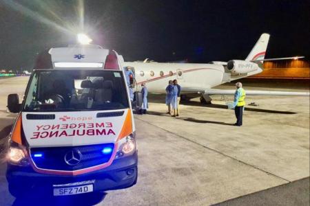 Couple with Covid-19 make it back to Singapore via air ambulance