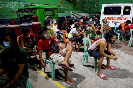 Churches in Manila closed, travel curbed amid spike in Covid cases