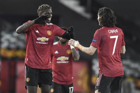 Paul Pogba (left) and Edinson Cavani