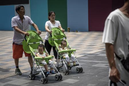 China says married couples can have up to three children